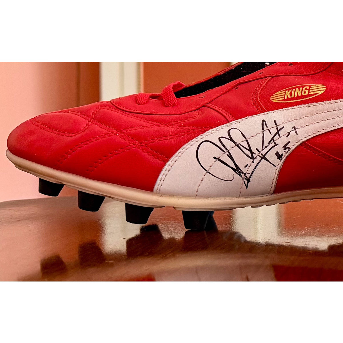 Vintage Puma King OG football boots in red/white, signed on both boots.