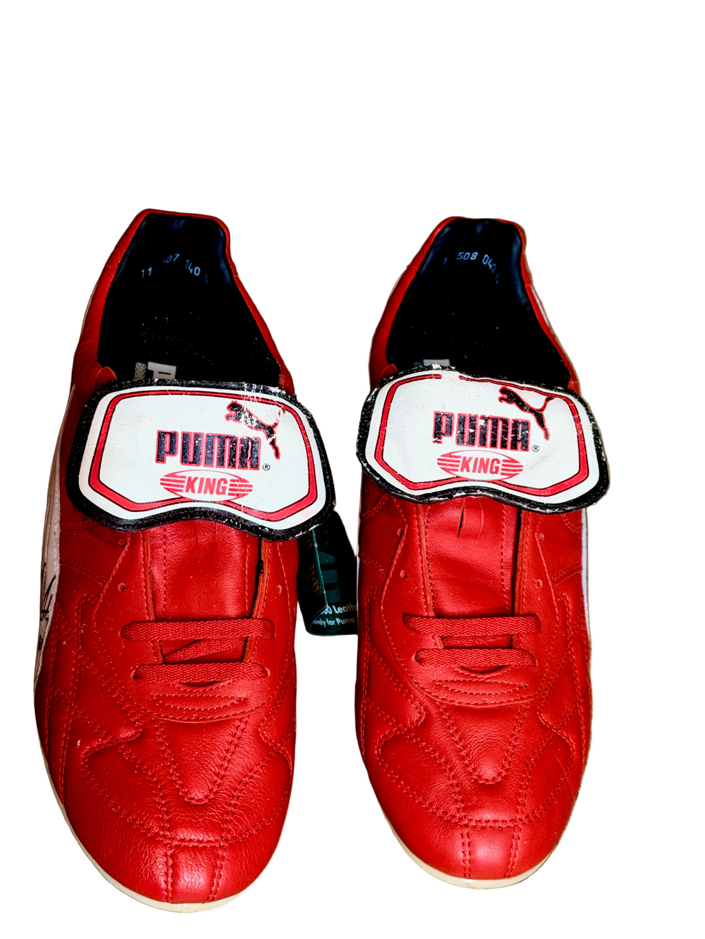 Vintage Puma King OG football boots in red/white, signed on both boots.
